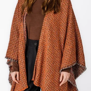 Poncho en tonos naranjas