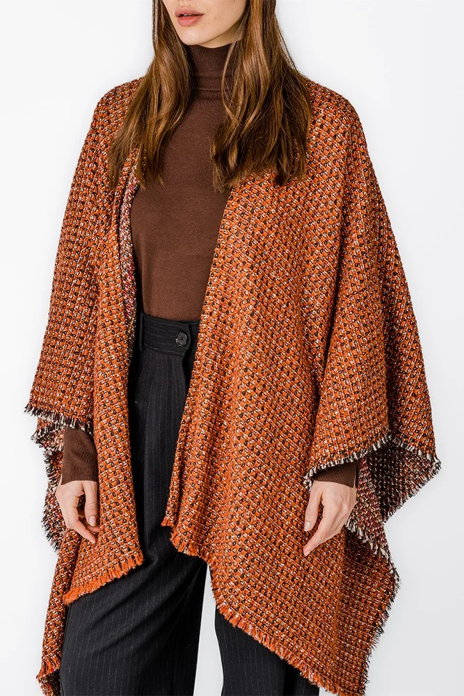 Poncho en tonos naranjas
