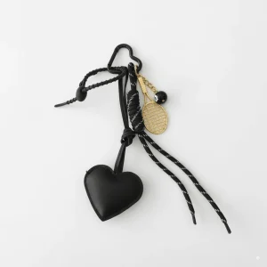 Charm raqueta y corazón negro