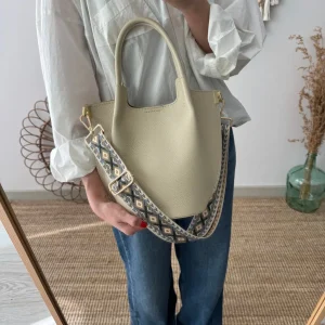 Bolso bucket asas rígidas beige