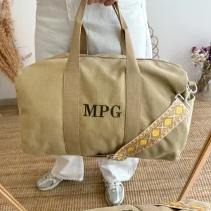Bolsa loneta ovalada beige iniciales bordadas